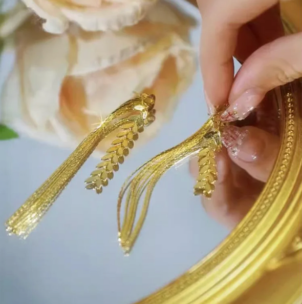 BOUCLES MARGAU-أقراط ذهبية